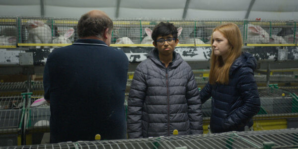 Picture of Bella Lack and Vipulan Puvaneswaran in a slaughterhouse