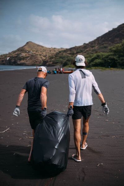 Thibaut Baronian and it's team collecting waste on a beach in Cape Verde